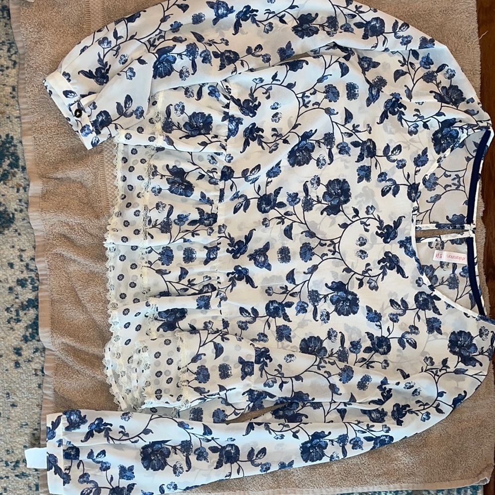 Xhilaration brand. Size large, fits small! Blue and white flower print blouse.